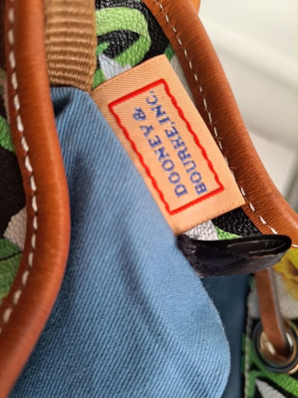 Dooney & Bourke Daffodil Tassel Drawstring Bucket Bag Purse Floral Leather Trim